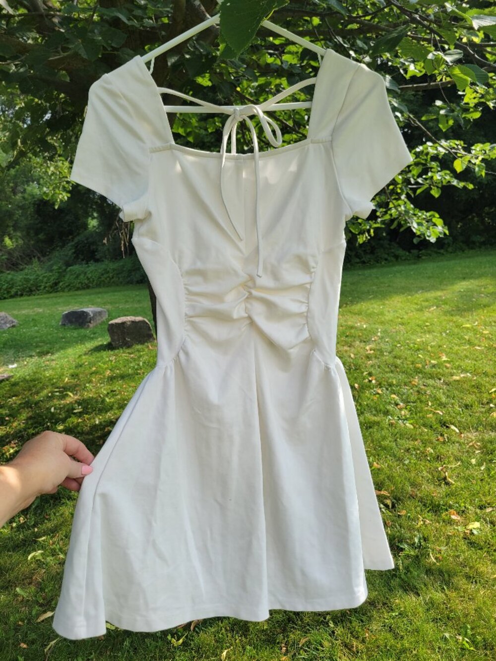Pretty white fit and flare ruched dress in size Medium